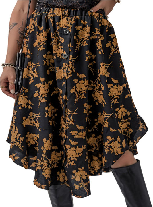 Floral ruffled skirt with elastic waistband and button detail in black.
