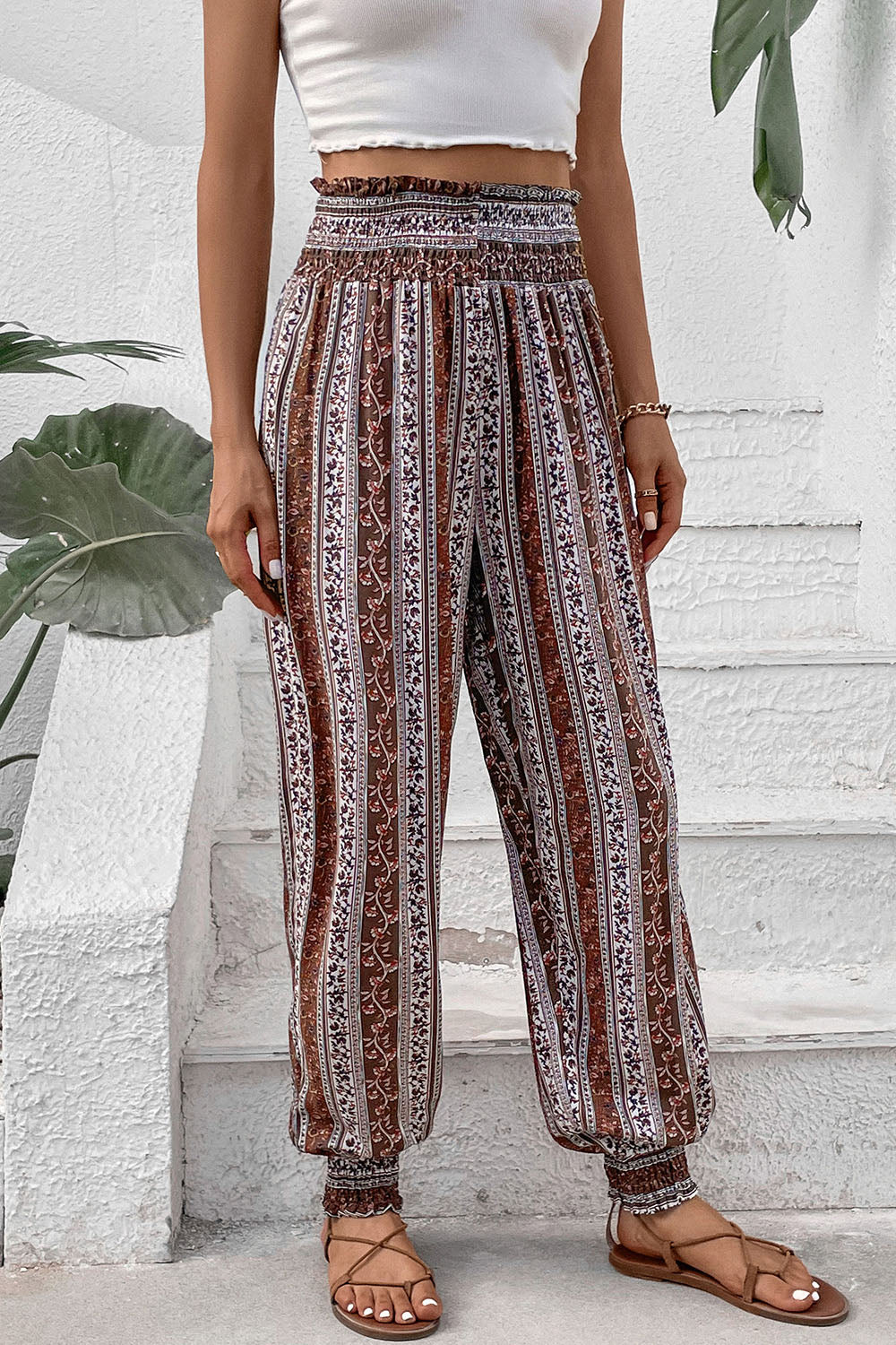 Boho striped pants with smocked waist and cuffs, perfect for beachwear.