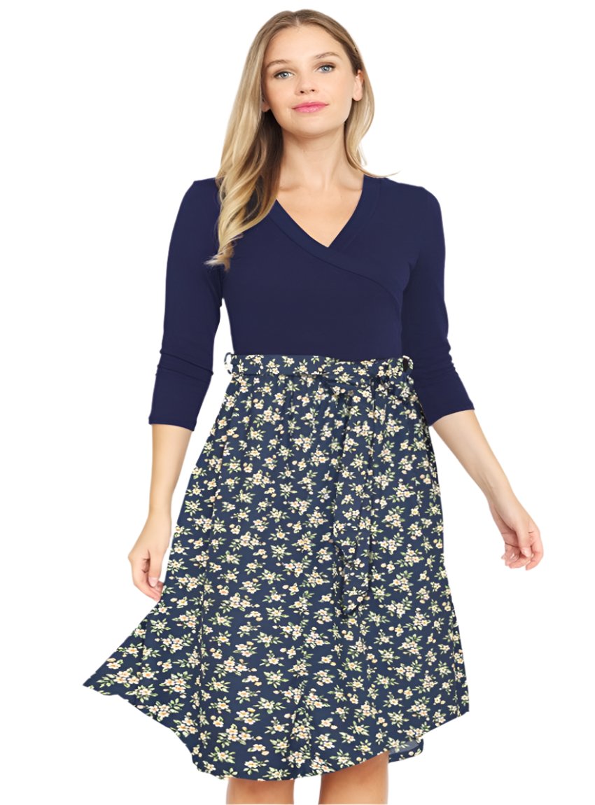 Navy floral wrap midi dress with 3/4 sleeves and v-neckline.
