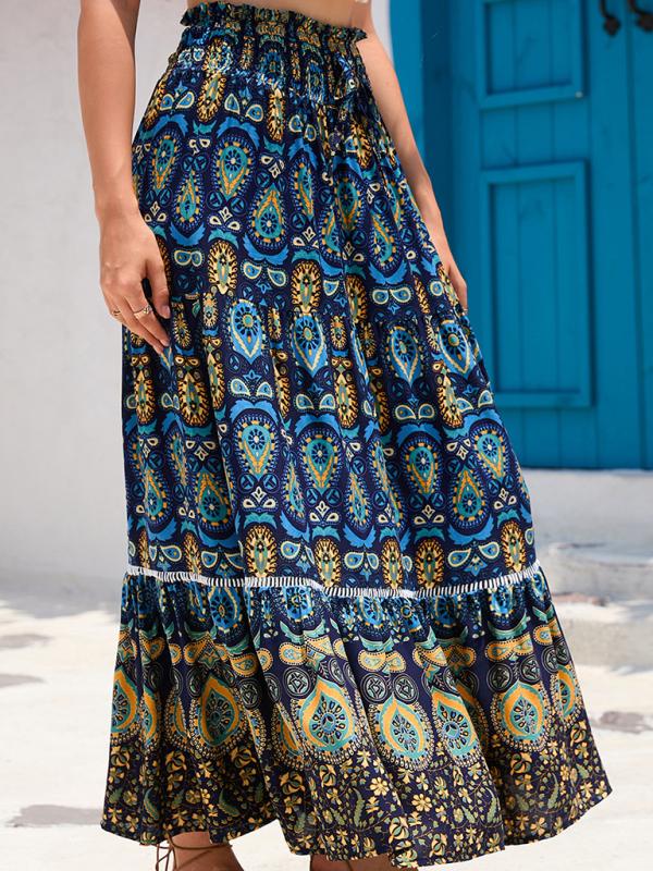 Flowing navy patchwork maxi skirt with a flattering A-line silhouette.
