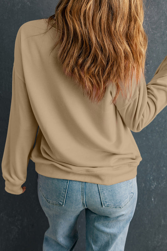 Cozy brown sweatshirt with a football graphic for football season.