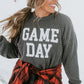 Comfy and stylish women's game day sweatshirt with bold white "Game Day" graphic.