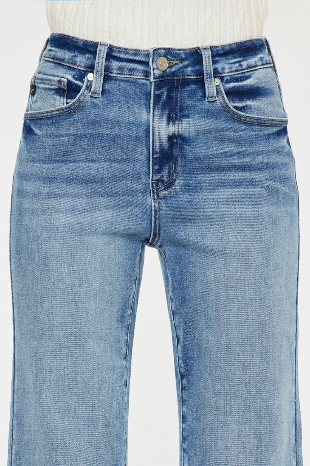 Front detail view of high-rise Kancan wide leg jeans.
