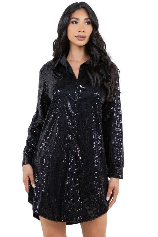 Close-up of a black sequin shirt dress showing the sparkling sequin detail and button-up front.
