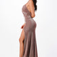 Full-length shot of a bronze mermaid gown with a dramatic slit, perfect for formal events.
