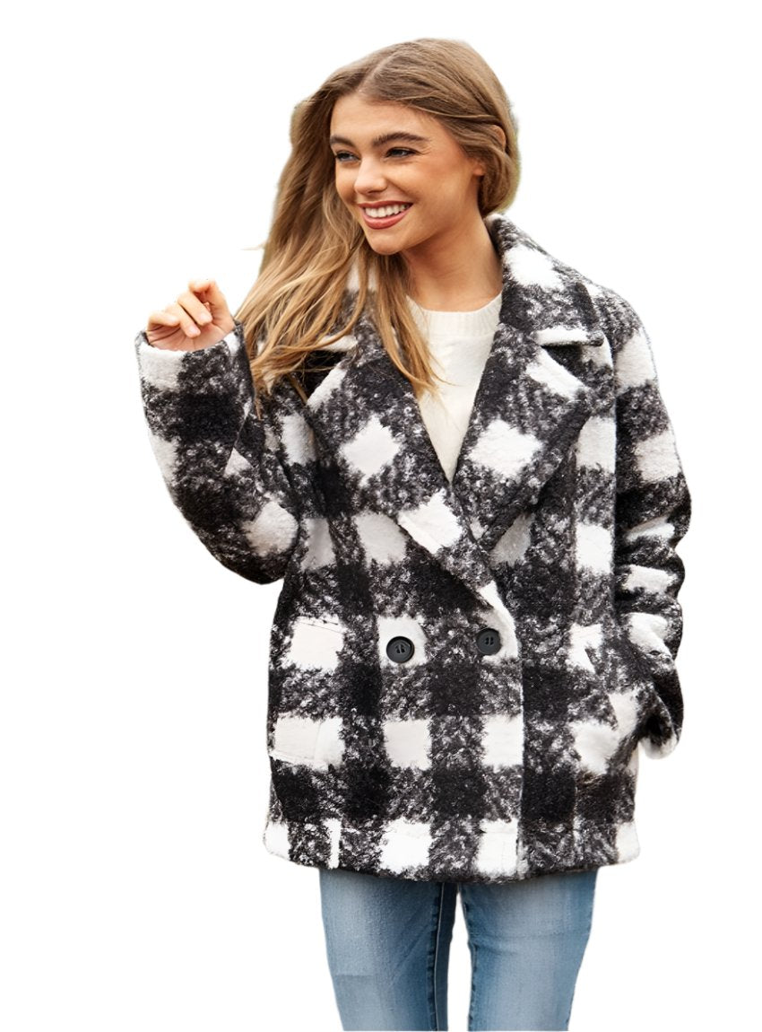 Women’s fuzzy boucle double-breasted coat in black, perfect for staying warm and stylish.
