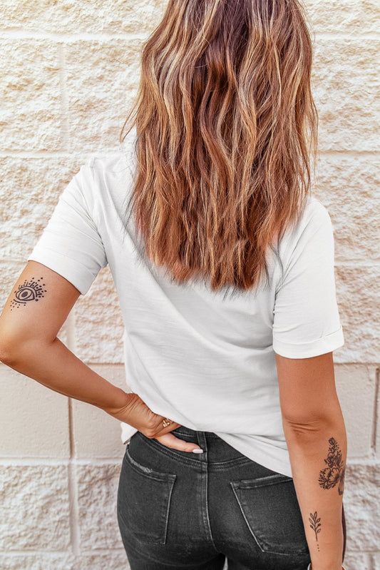 Sporty chic fashion featuring a white tee with a pink bow and football design.