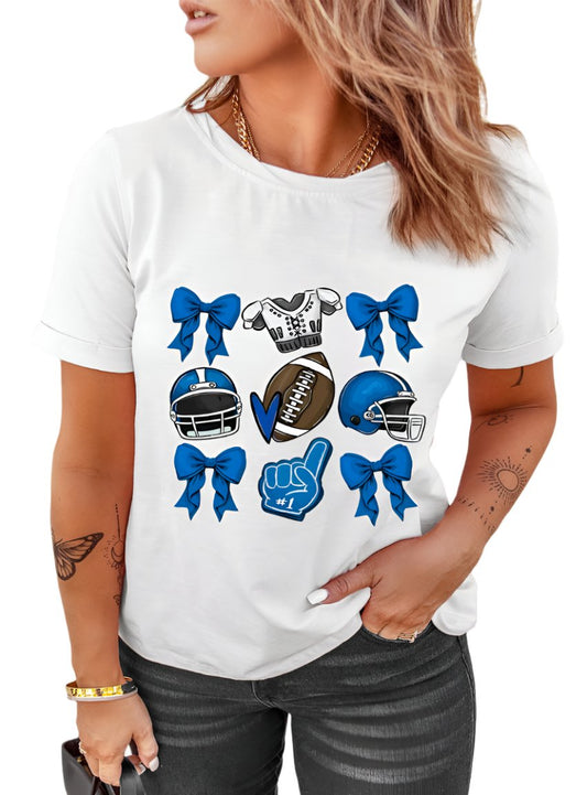 A white Game Day Graphic Tee featuring blue football helmets, bows, and a foam finger design.