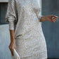 Silver sequin dress with off-shoulder neckline for a glamorous look.
