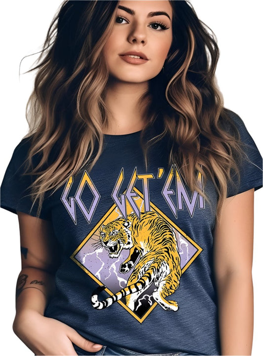 Woman wearing a navy "Go Get 'Em" tiger graphic tee with vibrant colors.