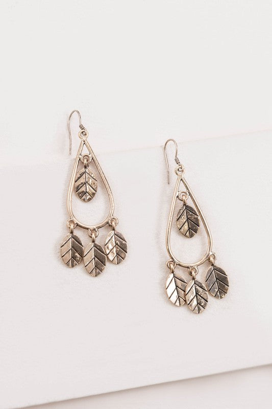 Gold Wind Swept Leaf Earrings with dangling leaves for a boho chic look.
