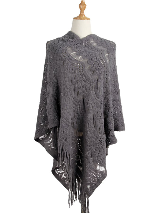 Gray boho knit poncho sweater with fringe details
