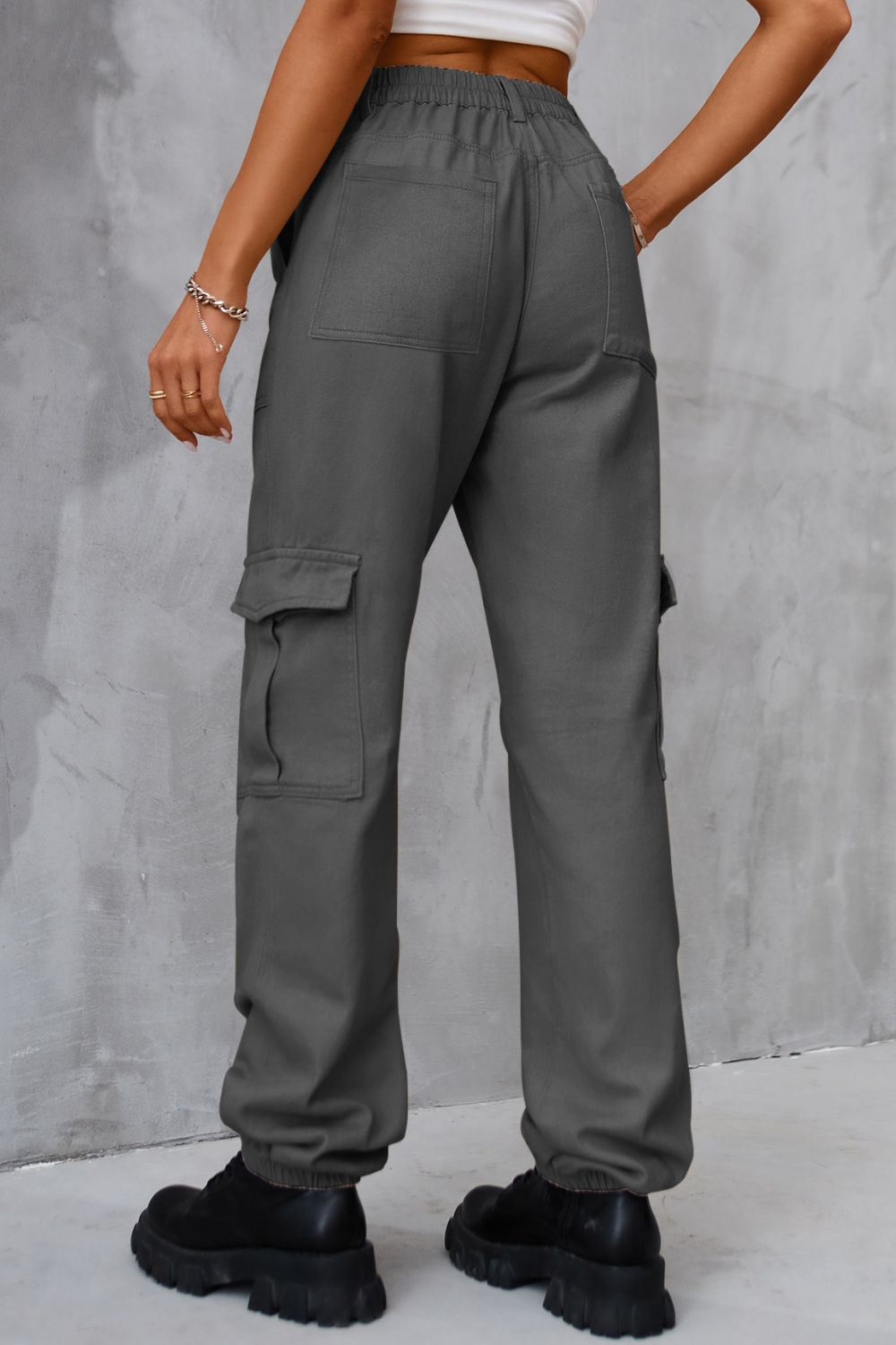 Casual gray cargo pants for women styled with a relaxed fit.
