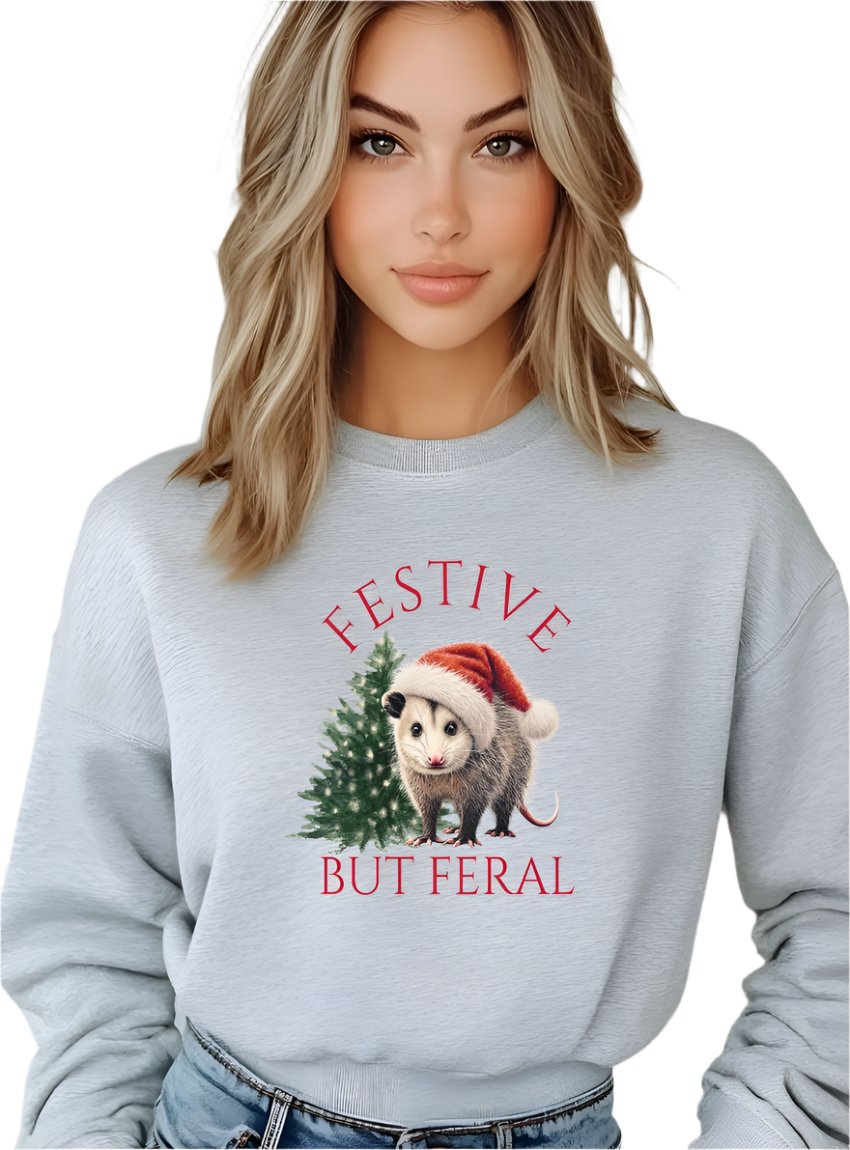 Front view of a gray "Festive but Feral" opossum sweatshirt in unisex sizing.
