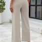 Comfortable gray high-waisted trousers with a flattering fit
