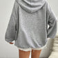 Soft and slightly stretchy gray hoodie with a front pocket and flag design.
