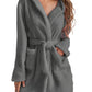 Plush hooded fleece robe in gray, perfect for staying warm during winter.
