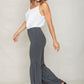 Gray ruffle hem pants styled with a soft, flowy design