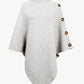 Front view of gray turtleneck buttoned poncho in ribbed knit.
