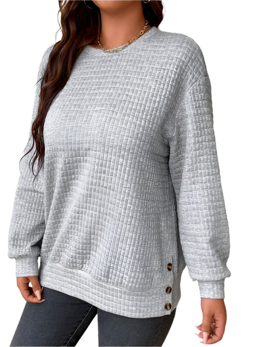 Gray waffle-knit sweatshirt with side button detailing, front view.
