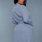 Back view of a gray waffle robe, showing the belted waist and comfortable fit.
