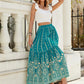 Full view of green boho skirt with maxi length and elegant details.