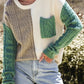 Green color block cable knit sweater styled with casual fall outfit.
