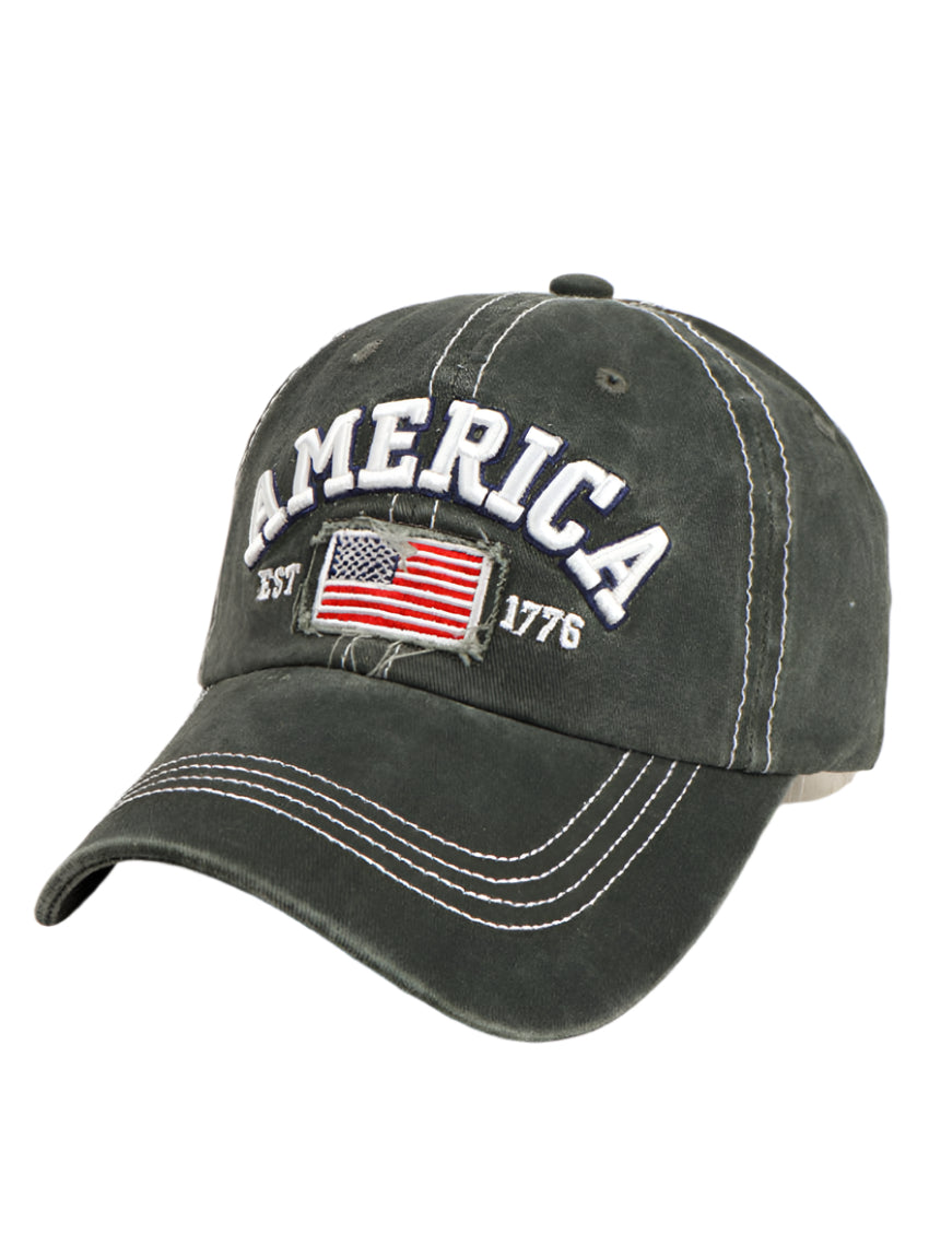 Front view of a green embroidered American flag denim baseball hat.
