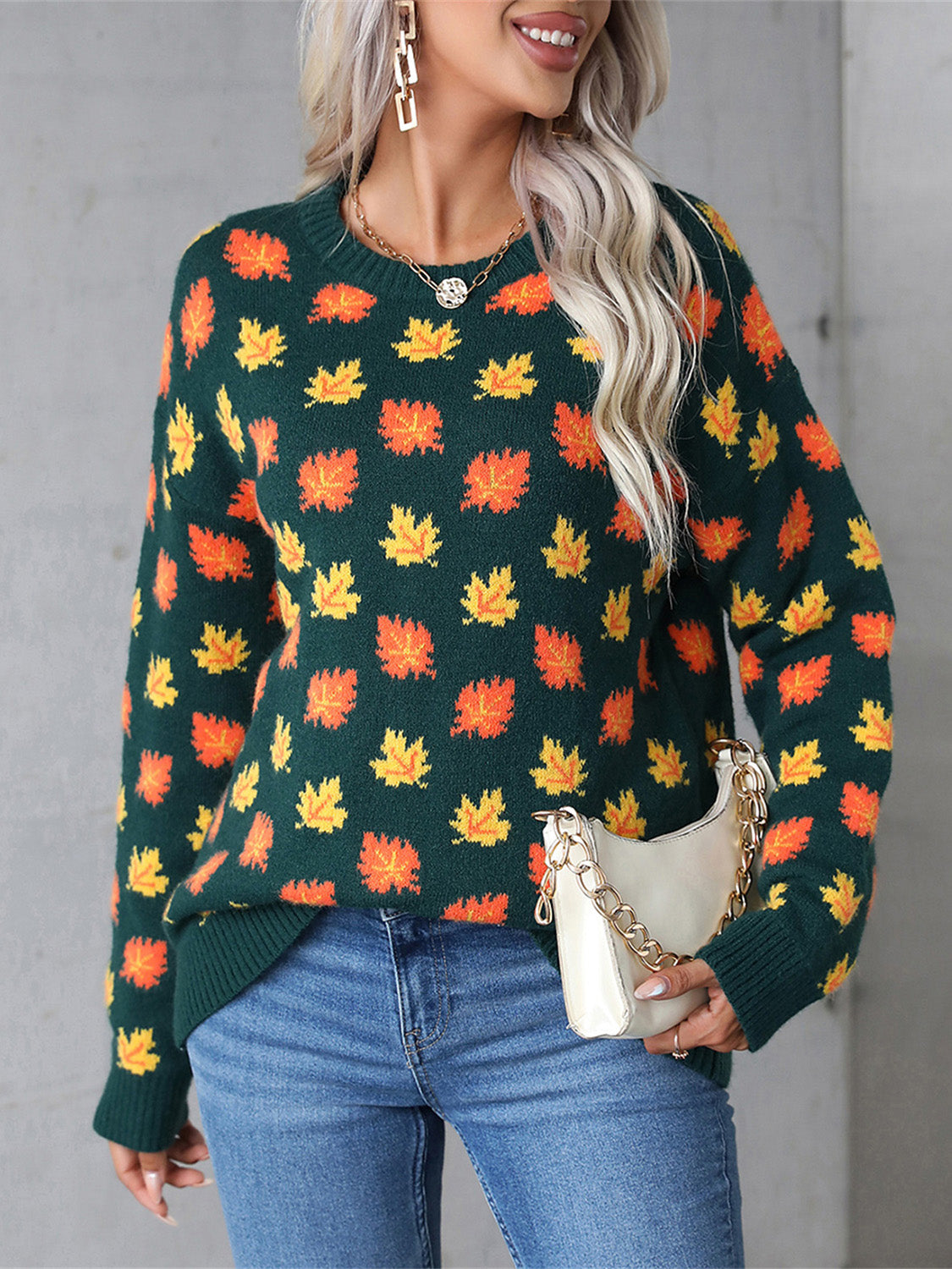 Front view of the green fall leaf print sweater, perfect for cozy autumn days.