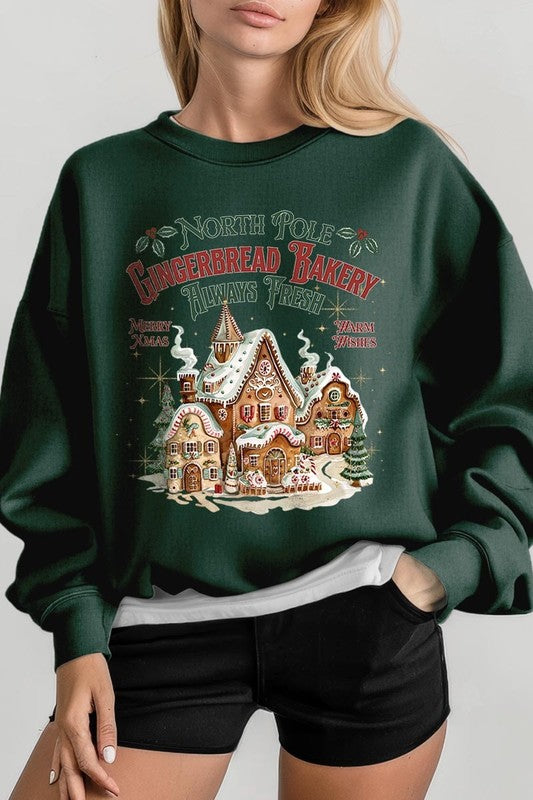 Festive green holiday sweatshirt with gingerbread bakery print, perfect for Christmas.