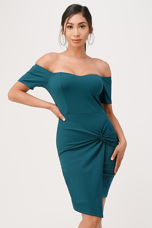 Stylish green twist-front dress, perfect for evening gatherings or special occasions.
