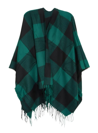 Green plaid poncho with soft fringe detailing
