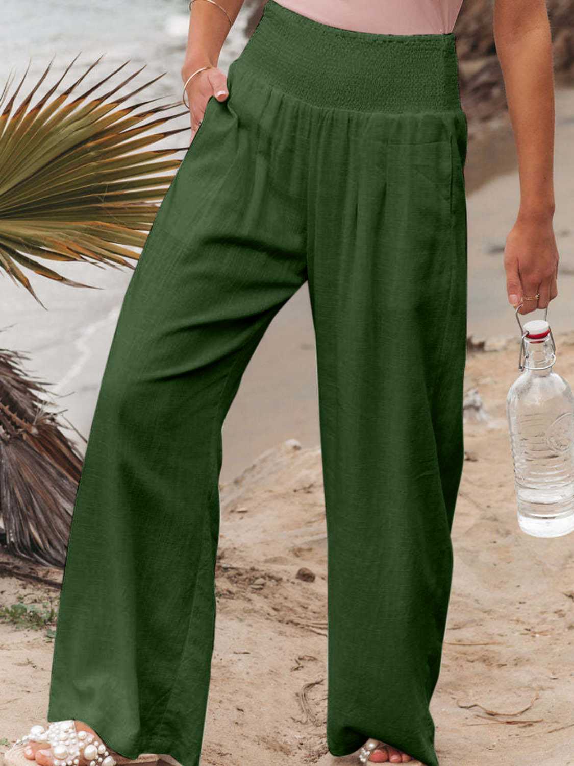 Green smocked waist wide leg pants with pockets
