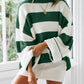 Green and white striped pullover with ribbed texture for added warmth.
