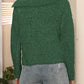 A casual outfit styled with the green textured knit sweater, ideal for a laid-back fall look.

