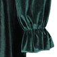 Green velvet dress featuring luxurious fabric and flattering silhouette.
