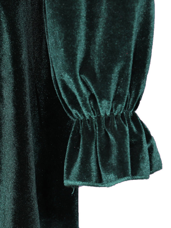 Green velvet dress featuring luxurious fabric and flattering silhouette.
