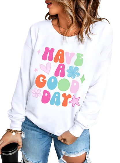 Front view of "Have A Good Day" graphic sweatshirt with colorful retro-inspired print.
