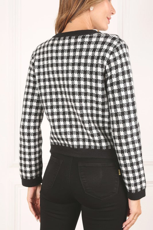 Women’s black and white checkered jacket for casual and office wear.
