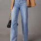 Comfortable high-waist straight jeans with pockets, offering a flattering fit.