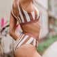 High-waist bikini bottoms offering tummy control with a striped pattern.
