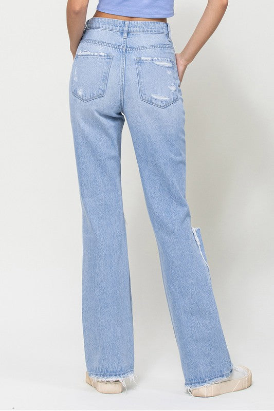 Women's flare jeans with a retro 90's feel and frayed hems
