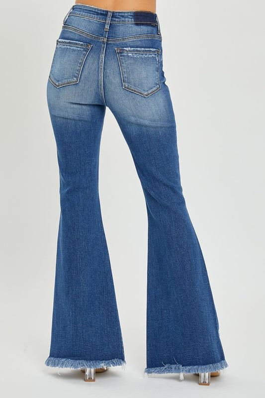 High-rise flare leg jeans with front slit detail and frayed hem
