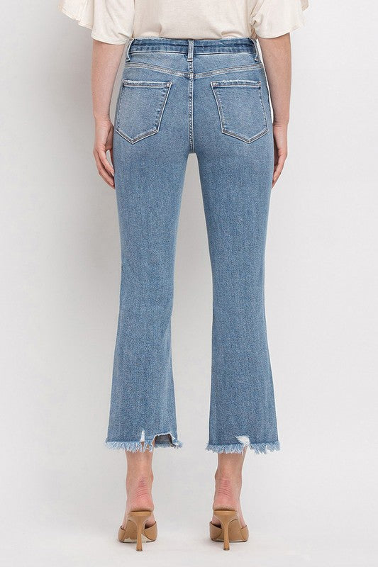 Trendy light wash high-rise crop flare jeans with retro-inspired flare.
