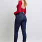 Trendy high-rise skinny jeans with unique heart-shaped back pockets.
