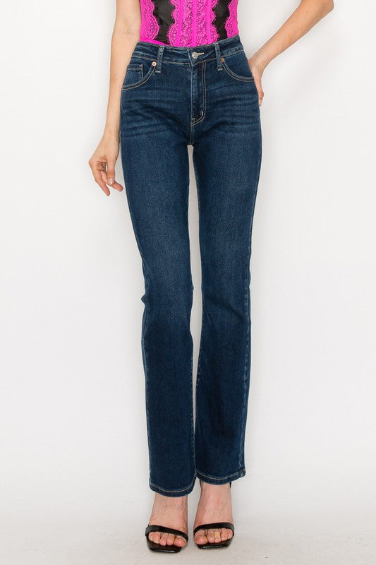 Plus size high-rise skinny bootcut jeans in dark wash denim.