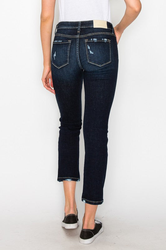 High-rise skinny straight leg jeans with light distressing.