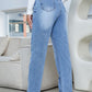 Side view of high-rise slim straight-leg jeans with functional pockets and slight stretch.
