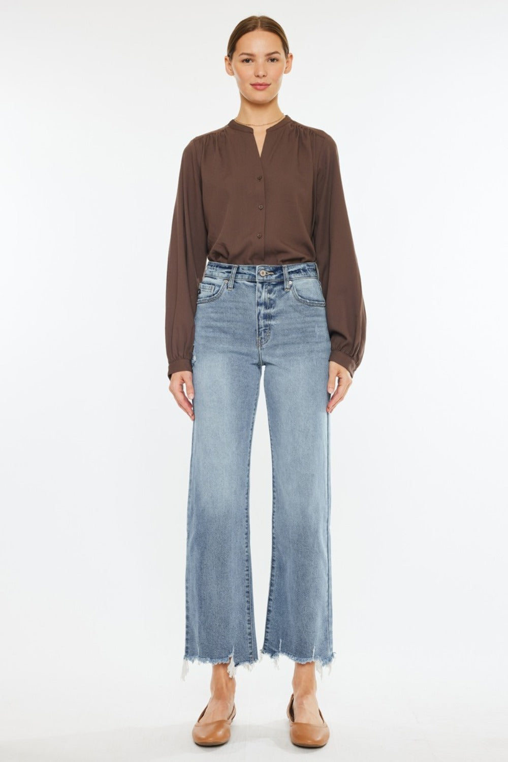 Slim-fit wide leg jeans with high waist and raw hem in light blue wash by Kancan.
