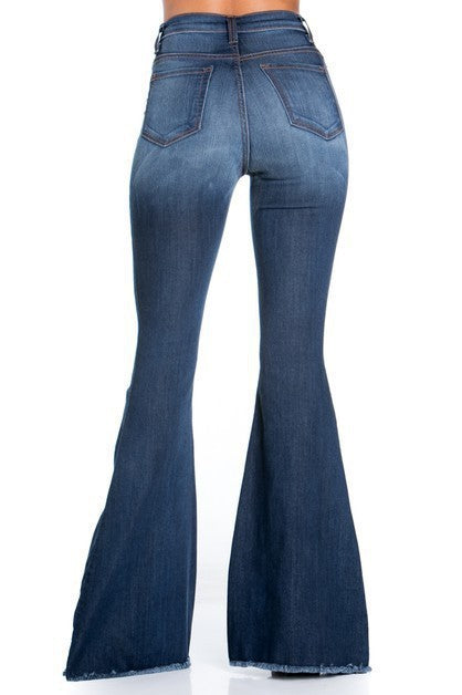 Dark wash bell bottom jeans with a retro-inspired flare and 32-inch inseam